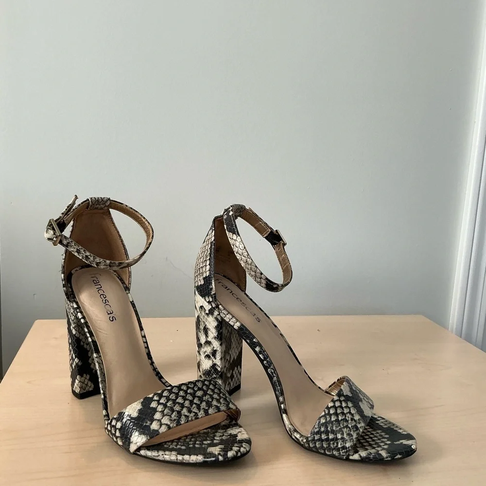 Francesca’s snake print embossed ankle strap heels